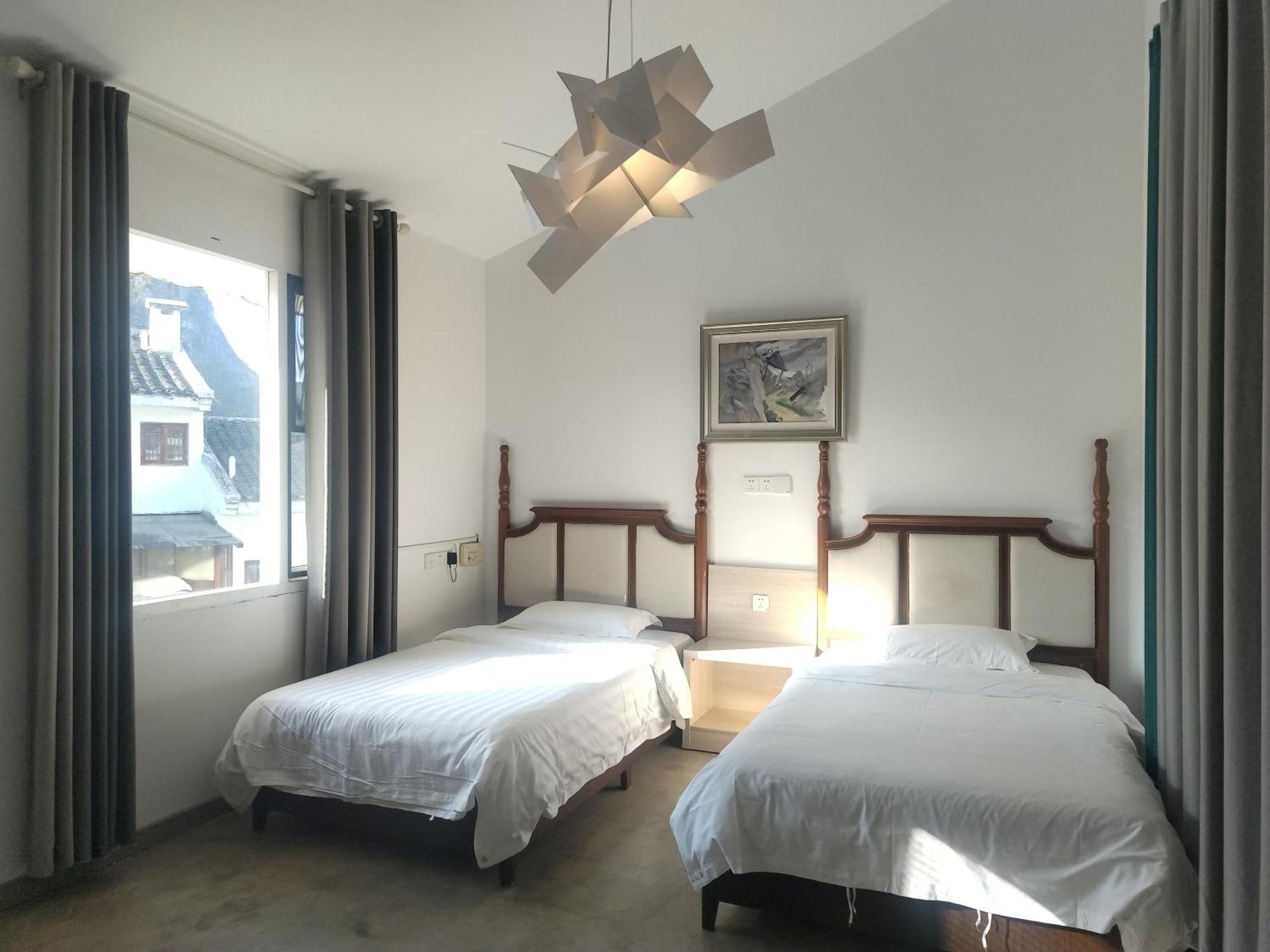 Serene Vale Inn Guilin-Free One Way Pick Up Service To High-Speed Railway Station For 2 Nights Exterior photo